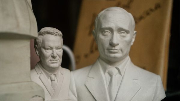 Busts of Russian President Vladimir Putin and the country's first president Boris Yeltsin are seen on sale in Moscow on March 11, 2020. Supporters celebrated and critics called for protests on March 11 as the prospect sunk in of Russian President Vladimir Putin staying in power until 2036. Lawmakers in the lower house State Duma voted on March 11 to give final approval to a package of constitutional amendments introduced by Putin -- including a last-minute addition to "reset" his presidential terms. Dimitar