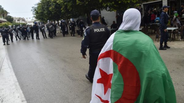 Algerian riot police gather during an anti-government demonstration in the capital Algiers on March 14, 2020. RYAD KRAMDI / AFP