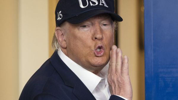 US President Donald Trump speaks to reporters during a press briefing about the Coronavirus (COVID-19) alongside members of the Coronavirus Task Force in the Brady Press Briefing Room at the White House in Washington, DC, March 14, 2020. President Donald Trump says he has taken coronavirus test, no result yet. JIM WATSON / AFP