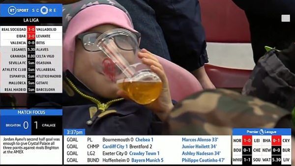 A child was spotted sinking a pint during a Bundesliga match on Saturday afternoon  (Dailymail)