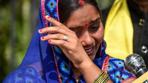 Punita Devi, wife of Akshay Thakur, one of the four men convicted for the gang-rape and murder of a student in 2012. AFP/File