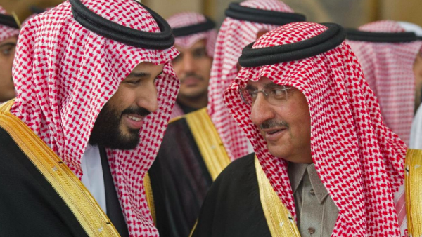 Mohammed bin Nayef, right, had been first in line for the throne until 2017, when Mohammed bin Salman, left, was elevated over him (AFP)