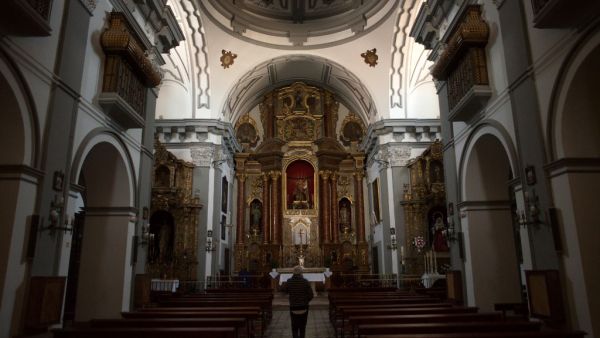 A man visits "Los Descalzos" church in Ronda on April 7, 2020, as Holy Week processions were cancelled during a national lockdown to prevent the spread of the COVID-16 outbreak. AFP