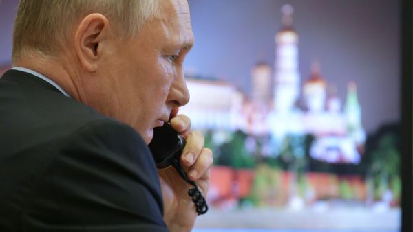 Russian President Vladimir Putin attends a meeting on the situation with the spread of the COVID-19 coronavirus disease in Russia, via a teleconference call at the Novo-Ogaryovo state residence outside Moscow on April 13, 2020. Alexey DRUZHININ / SPUTNIK / AFP