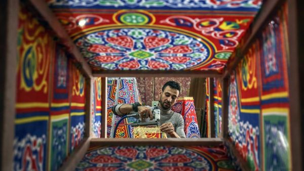 A Palestinian craftsman fashions a traditional "fanous" lantern, a decoration used to celebrate the start of the Muslim holy month of Ramadan beginning later in the week, in a workshop in Khan Yunis in the southern Gaza Strip. From cancelled iftar (fast breaking) feasts to suspended mosque prayers, Muslims across the Middle East are bracing for a bleak month of Ramadan fasting as the threat of the COVID-19 pandemic lingers. The holy Muslims fasting month of Ramadan is a period for both self-reflection and s