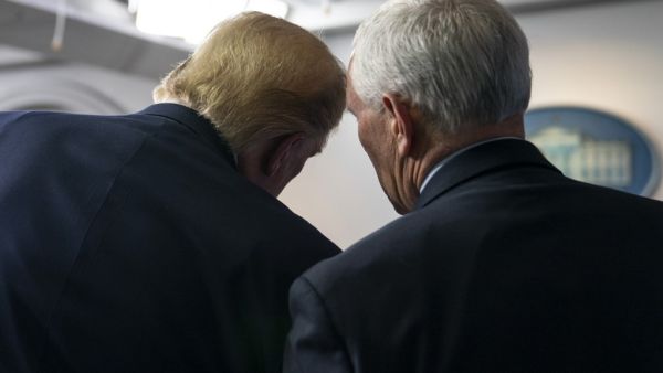 Vice President Mike Pence and U.S. President Donald Trump participate in a press briefing with members of the White House Coronavirus Task Force on April 4, 2020 in Washington, DC.  AFP
