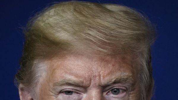 U.S. President Donald Trump attends the daily coronavirus task force briefing at the White House on April 24, 2020 in Washington, DC. Earlier on Friday, President Trump signed into law the Paycheck Protection Program and Health Care Enhancement Act, a $484 billion bill that aids small businesses and hospitals under stress from the coronavirus pandemic. Drew Angerer/Getty Images/AFP Drew Angerer / GETTY IMAGES NORTH AMERICA / Getty Images via AFP