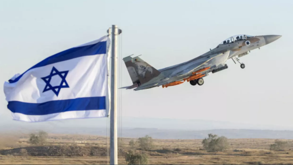An Israeli Air Force F-15 Eagle fighter plane performs at an air show during the graduation of new cadet pilots at Hatzerim base in the Negev desert, on June 29, 2017. Jack Guez, AFP