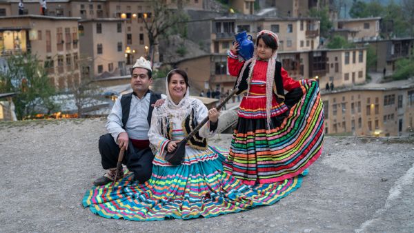 Iranian family in Persian traditional clothes at village of Masuleh in Gilan province (Shutterstock)