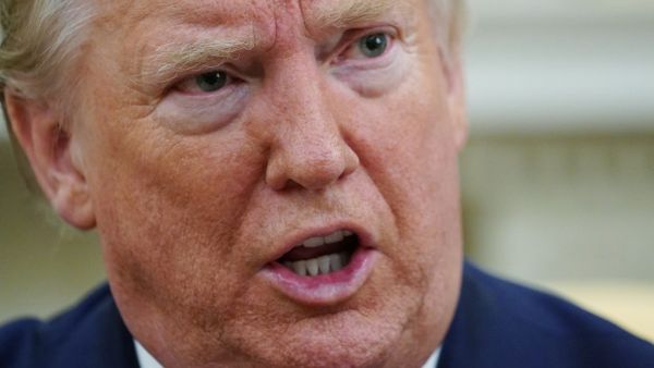 In this file photo US President Donald Trump speaks during a meeting with Louisiana Governor John Bel Edwards(D-LA) in the Oval Office of the White House in Washington, DC on April 29, 2020. Donald Trump will wrap himself in the mantle of America's arguably greatest president with a television extravaganza May 3, 2020 at the Lincoln Memorial meant to leave the coronavirus crisis behind and relaunch his election campaign. The businessman Republican is doing poorly in most polls ahead of the November presiden