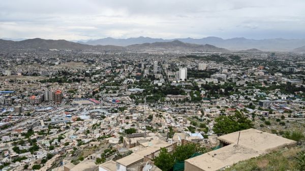 A general view shows the city from the top of a hillside, in Kabul on May 17, 2020. WAKIL KOHSAR / AFP