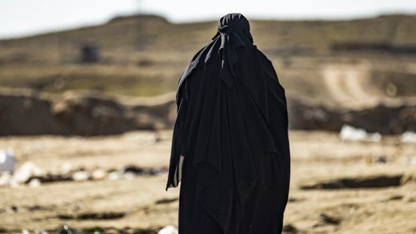 In this file photo taken on January 14, 2020 A French woman walks at the section reserved for foreigners, inside the Kurdish-run al-Hol camp for the displaced in the al-Hasakeh governorate in northeastern Syria.(AFP)