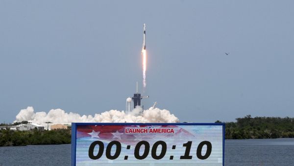 A SpaceX Falcon 9 rocket carrying the Crew Dragon spacecraft lifts off from launch complex 39A at the Kennedy Space Center in Florida on May 30, 2020. NASA astronauts Hurley and Bob Behnken are set to depart for an extended stay at the International Space Station on the SpaceX Demo-2 mission. Gregg Newton / AFP