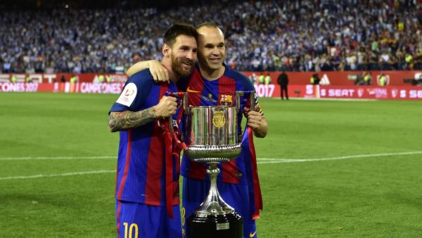 صورة أرشيفية لإنييستا وميسي