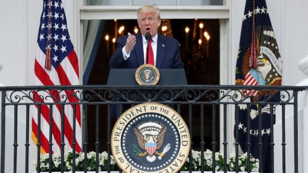 U.S. President Donald Trump speaks from the Truman Balcony during a Rolling to Remember Ceremony: Honoring Our Nations Veterans and POW/MIA at the White House May 22, 2020 in Washington, DC. (AFP/File)