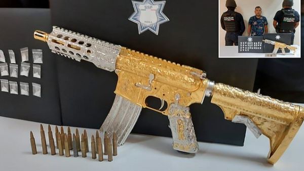 Personalized gold-plated AR-15 assault rifle (Twitter)