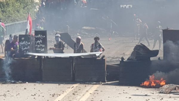 حرق مقار حزبية في العراق