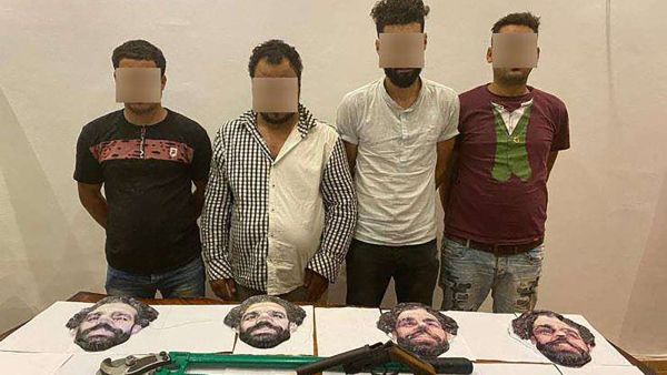  Four men have been arrested in Cairo after using the Liverpool forward's face as a disguise to rob stores (Photo: Goal.com)