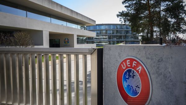 A picture taken in Nyon on March 17, 2020 shows the gate at the headquarters of UEFA (Photo: AFP)