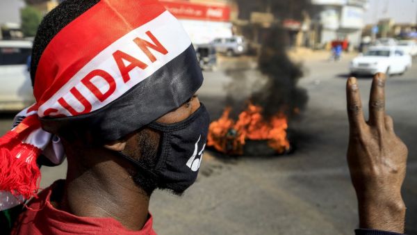 Scores of protesters were killed when armed men in military fatigues stormed the sprawling encampment outside Khartoum's army headquarters on June 3 last year. ASHRAF SHAZLY / AFP