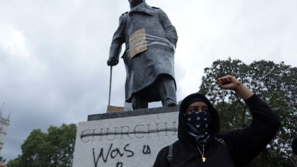 Taking a knee, banging drums and ignoring social distancing measures, outraged protesters from Sydney to London on Saturday kicked off a weekend of global rallies against racism and police brutality. ISABEL INFANTES / AFP