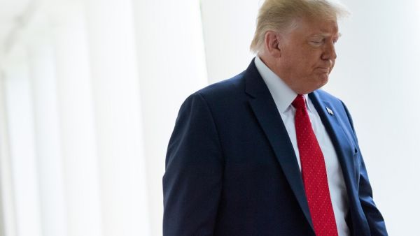 US President Donald Trump arrives for the event where he will sign an executive order on police reform, in the Rose Garden of the White House in Washington, DC, June 16, 2020. SAUL LOEB / AFP