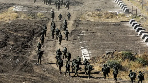 Israeli army soldiers take part in a military drill in the Israeli-annexed Golan Heights on June 24, 2020. JALAA MAREY / AFP