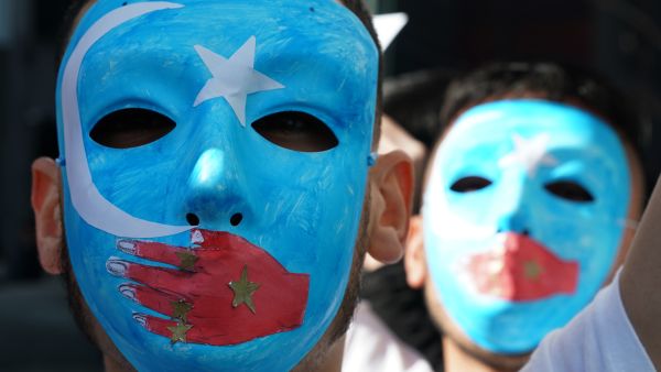 People protest at a Uighur rally on February 5, 2019 in front of the US Mission to the United Nations, to encourage the State Department to fight for the freedom of the majority-Muslim Uighur population. (Timothy A. Clary/ AFP/Getty Images)
