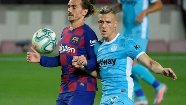 أنتوان غريزمان (يسار)