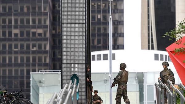 Soldiers were also pictured standing guard in the typically-bustling business district, which was completely cordoned off while the police carried out a search. (AFP/File)