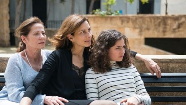 Clemence Sabbagh, left, Rim Turki and Paloma Vauthier in a scene from Joana Hadjithomas and Khalil Joreige’s new feature ‘Memory Box.’ (Twiter)