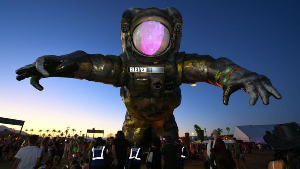 Overview Effect, the astronaut sculpture by Poetic Kinetics, roams around the opening day of the Coachella Valley Music and Arts Festival (Credit: Valerie Macon/AFP/Getty Images)