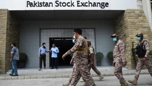 Paramilitary officers inspect the premisses of the Pakistan Stock Exchange building following an attack by gunmen in Karachi on June 29, 2020. Rizwan TABASSUM / AFP