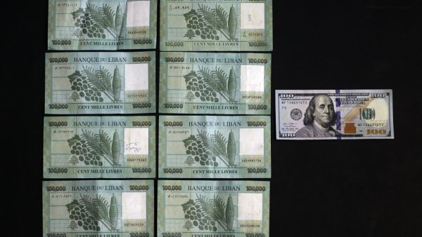 A picture taken on June 29, 2020 shows the black market rate, as calculated by specialised websites, of 100 USD in Lebanese Liras on the day of shoot on June 29. The Lebanese currency officially remains pegged at around 1,507 pounds to the dollar, but the black market rate on Monday morning reached a new record of 8,000, according to several specialised websites. The cap on dollar withdrawals has led those in need of the foreign currency to resort to changers on the black market instead, sending the exchang