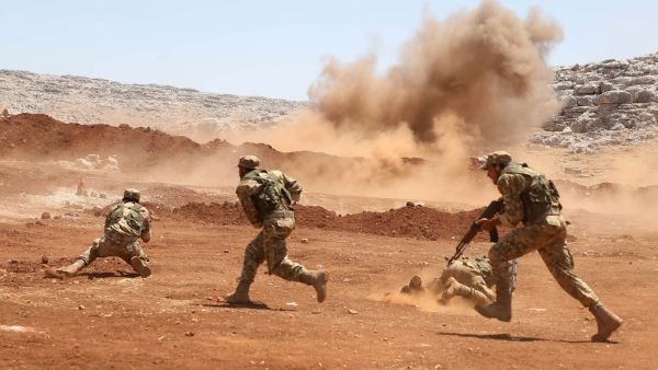 Members of Syria's opposition National Liberation Front take part in a military training in the northern countryside of Idlib province, on July 1, 2020. AAREF WATAD / AFP