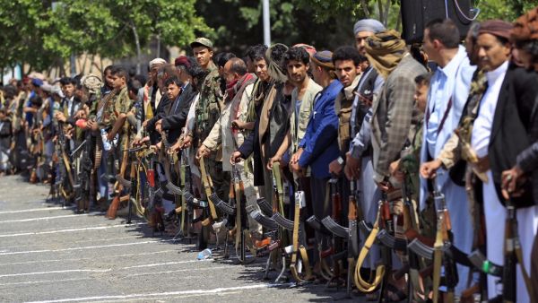 Yemeni gunmen loyal to the Huthi movement brandish their weapons during a gathering in the capital Sanaa, to show support to the movement against the Saudi-led intervention in the country on July, 7, 2020. MOHAMMED HUWAIS / AFP
