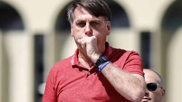 Brazil President Jair Bolsonaro announced on July 7, 2020 he had tested positive for the coronavirus but said he was feeling "perfectly well" and had only mild symptoms. Sergio LIMA / AFP