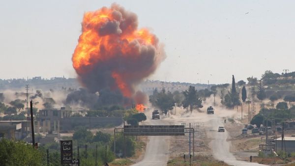 A fireball erupts from the site of an explosion reportedly targeting a joint Turkish-Russian patrol on the strategic M4 highway, near the Syrian town of Ariha in the rebel-held northwestern Idlib province, on July 14, 2020. Mohammed AL-RIFAI / AFP