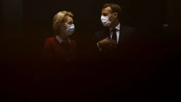 President of the European Commission Ursula von der Leyen (L) talks with France's President Emmanuel Macron prior the start of the EU summit at the European Council building in Brussels, on July 18, 2020, as the leaders of the European Union hold their first face-to-face summit over a post-virus economic rescue plan. The EU has been plunged into a historic economic crunch by the coronavirus crisis, and EU officials have drawn up plans for a huge stimulus package to lead their countries out of lockdown.  Fra