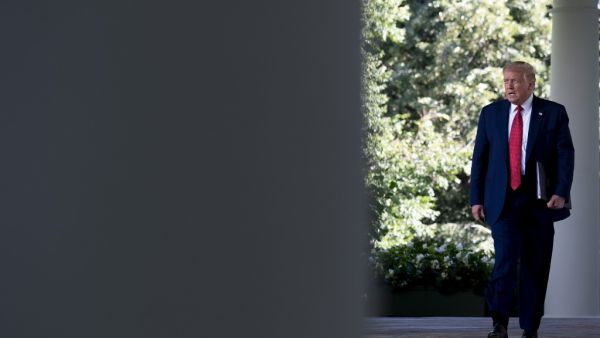 In this file photo taken on July 14, 2020 US President Donald Trump arrives to deliver a press conference in the Rose Garden of the White House in Washington, DC. Donald Trump has 100 days from Sunday to save his presidency as America tries to avoid a collective nervous breakdown ahead of one of the most divisive, tension-filled elections in US history. JIM WATSON / AFP