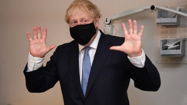 Britain's Prime Minister Boris Johnson gestures during his visit to the Tollgate Medical Centre in Becton, east London on July 24, 2020..   Jeremy Selwyn / POOL / AFP