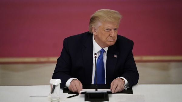  U.S. President Donald Trump listens during an event about citizens positively impacted by law enforcement, in the East Room of the White House on July 13, 2020 in Washington, DC.  Drew Angerer / GETTY IMAGES NORTH AMERICA / Getty Images via AFP
