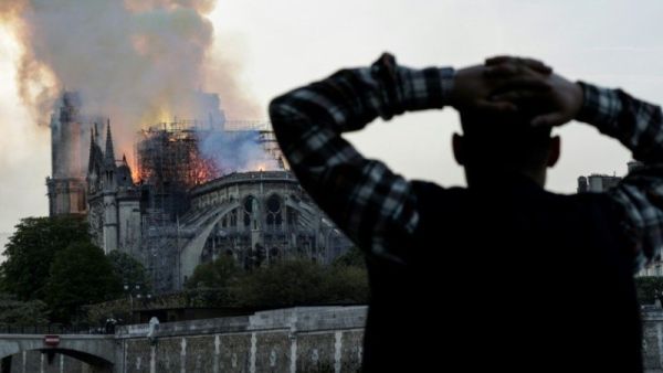 Macron wants Notre-Dame restored to its former glory by 2024, in time for the Paris Olympics. (AFP/File Photo)