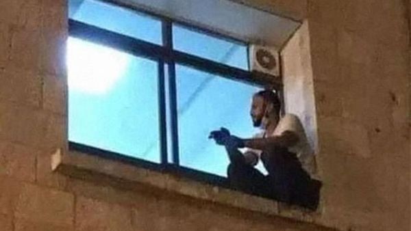 A moving photo shows Jihad sitting on the window ledge. (Facebook)