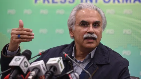 Zafar Mirza briefs the media on the coronavirus, in Islamabad, on Feb. 1. (Farooq Naeem/AFP/Getty Images)