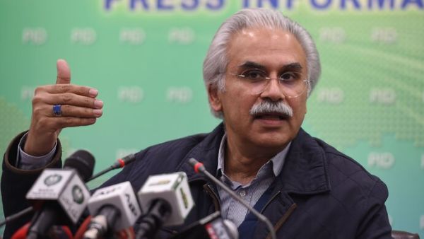 Zafar Mirza briefs the media on the coronavirus, in Islamabad, on Feb. 1. (Farooq Naeem/AFP/Getty Images)