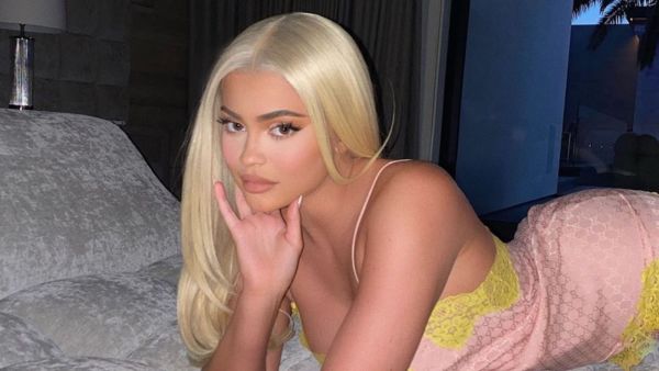 She had on the sleeveless gold dress,