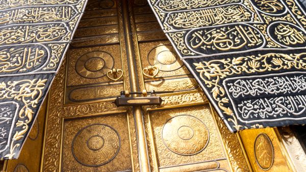 The golden doors of the Holy Kaaba closeup, covered with Kiswah. Massive lock on the doors. (Shutterstock/ File Photo)
