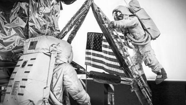 A scene of the famous Apollo program, two mannequins astronauts exiting their Lunar lander and walking on the Moon, at the Smithsonian National Air and Space Museum  (Shutterstock)	