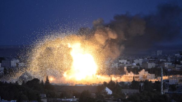 An explosion after an apparent US-led coalition airstrike on Kobane, Syria. (Shutterstock/ File Photo)